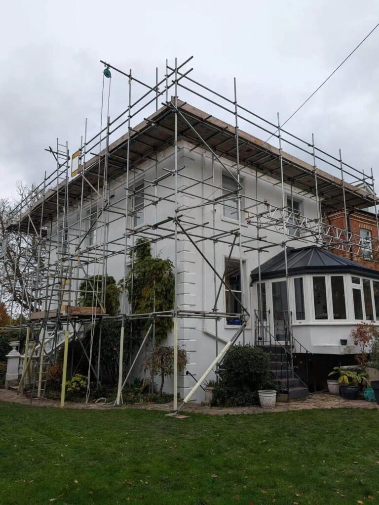 scaffolding setup around house.jpeg 768x1021