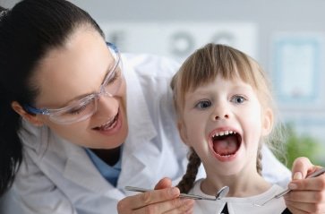 male professional dentist with gloves mask 3